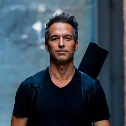 TRAVIS ELIOT