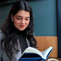 Ula, in a library